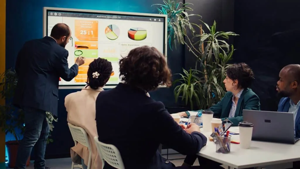 Manager creates visual presentation to pitch marketing strategy