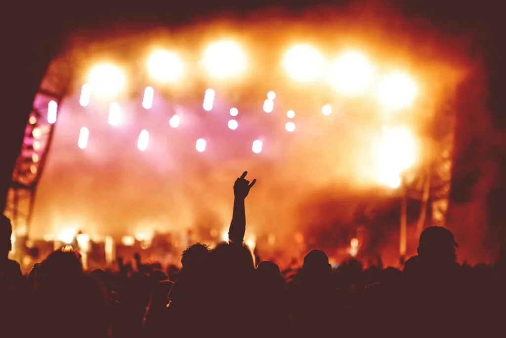 hand with stage lights background