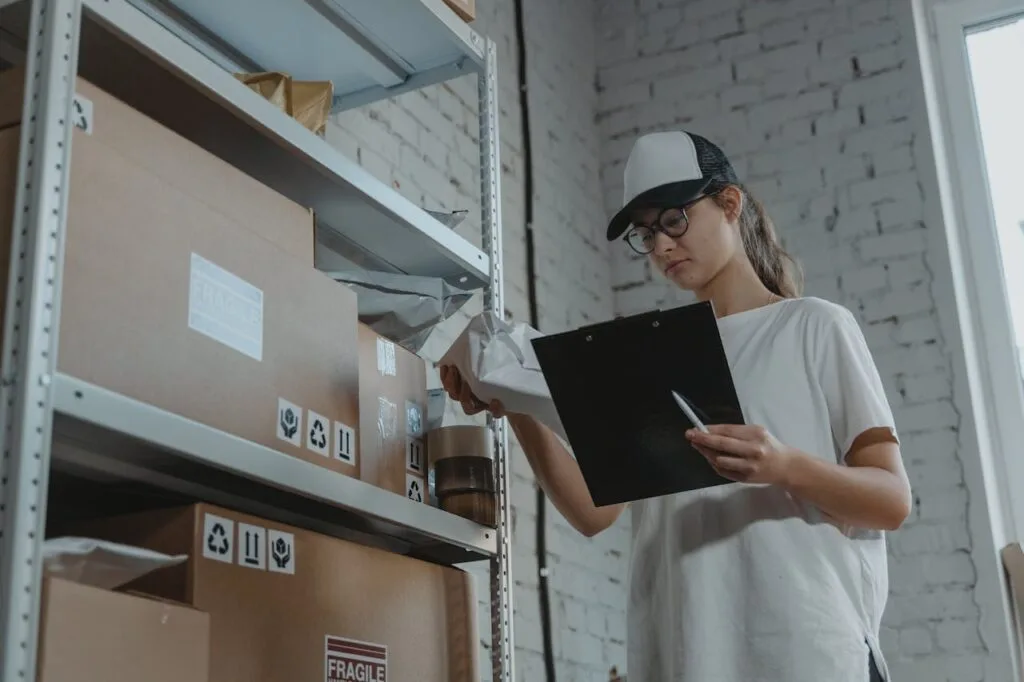 A girl reviewing stocks and inventory.