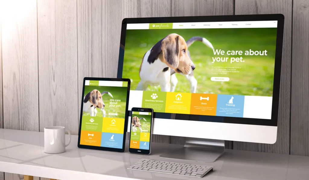 Digital generated devices on desktop, responsive pet website design on screen. All screen graphics are made up. 3d rendering.
