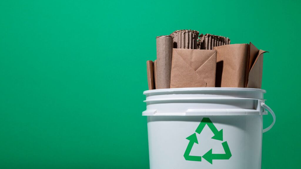 trash bin with recycling symbol