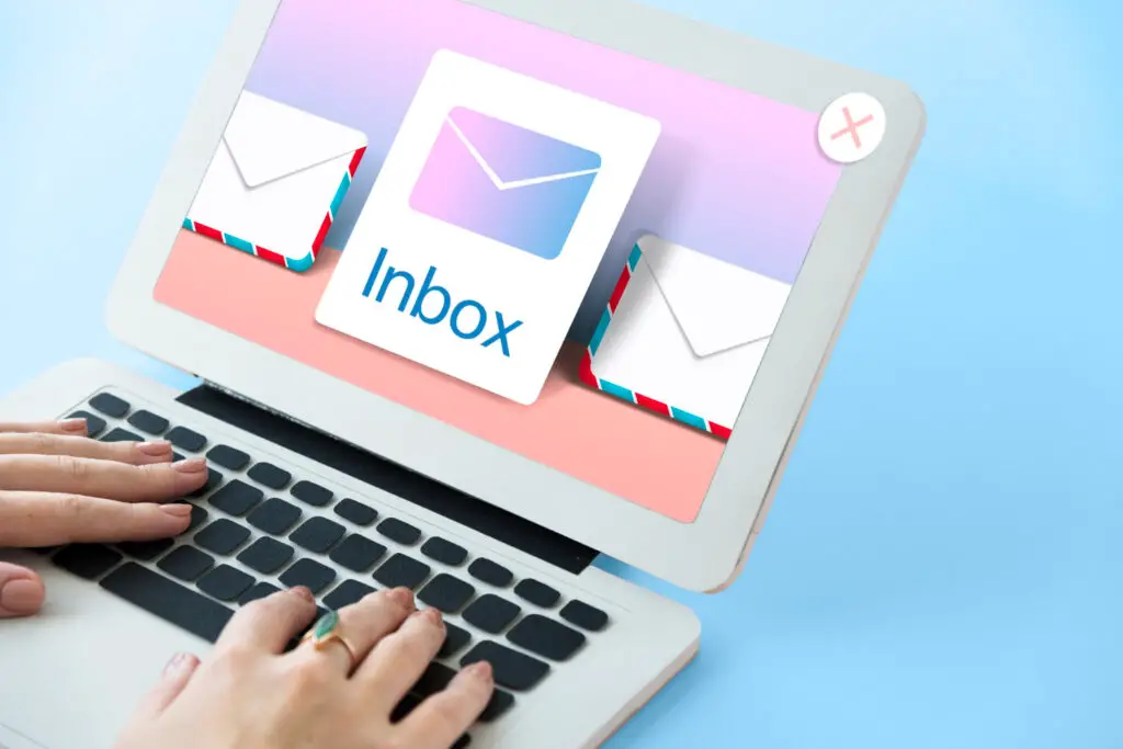 The icon representing the email inbox on a laptop.