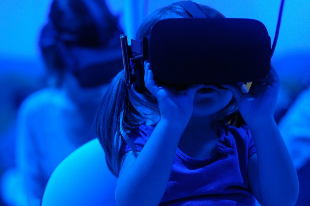 child using virtual reality glasses